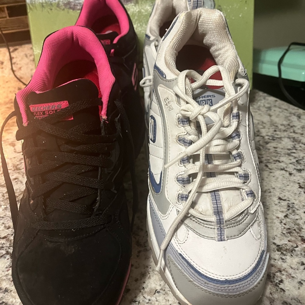Two pair of Sketcher Work shoes with alloy toe
